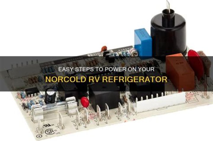 How do I turn on my Norcold refrigerator in my RV?