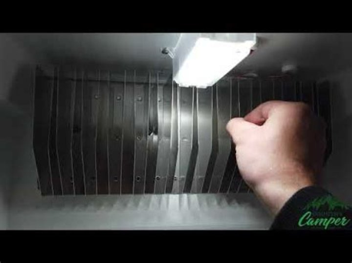How do you adjust the temperature on a Norcold RV?