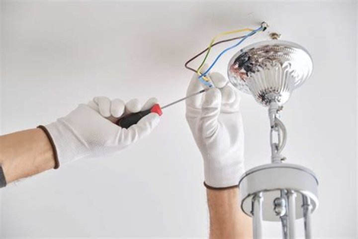 How much does it cost to have a ceiling light replace?