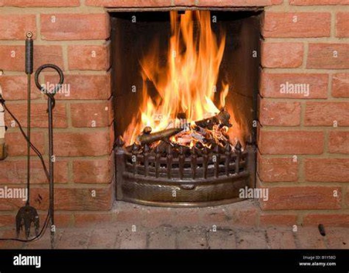 Is it safe to have an open fire in a fireplace?