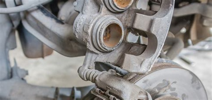 What causes low spongy brakes?