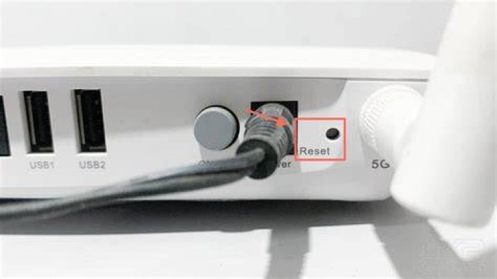 What happens if I push the reset button on my modem?