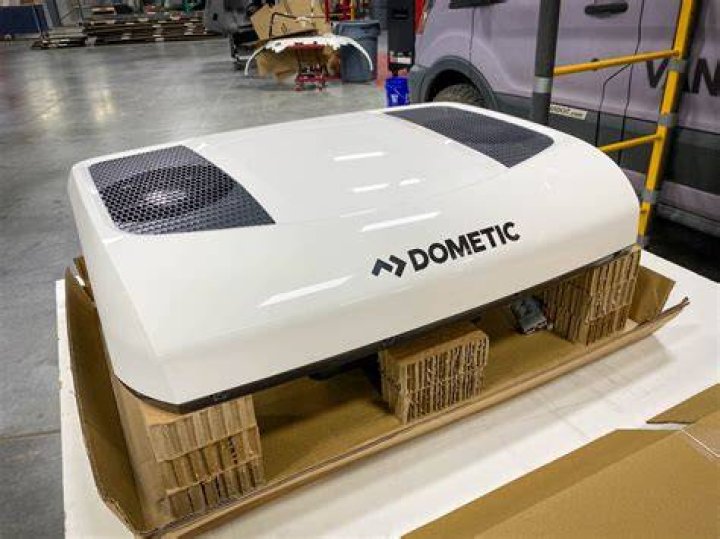 What kind of refrigerant does a Dometic air conditioner use?
